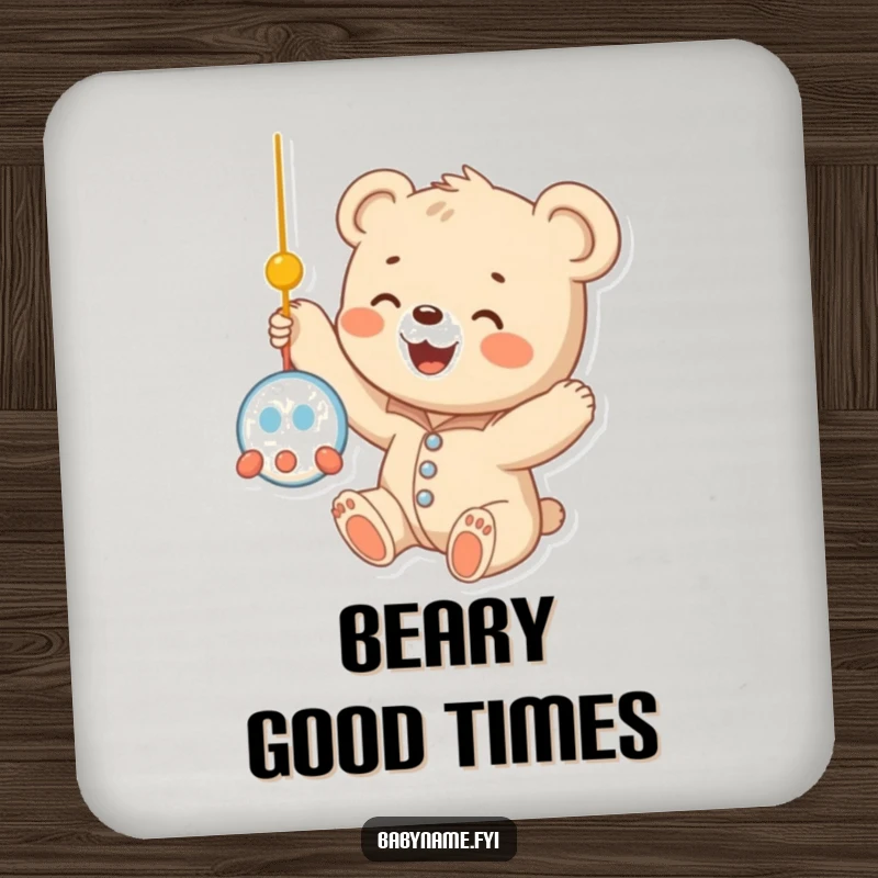 Funny baby bear cub in a onesie, reaching for a dangling mobile, depicted with endearing cuteness on this protective and humorous drink coaster.