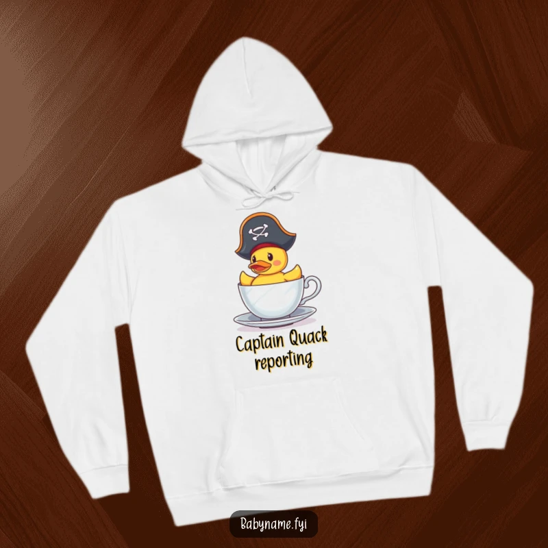 Funny Hoodie: A tiny pirate rubber duck navigates a teacup, bringing cozy nautical charm and humorous adventure to your day.