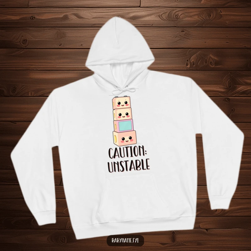 Funny building block hoodie with a cheerful, precariously stacked block character, perfect for cozy, humorous days.