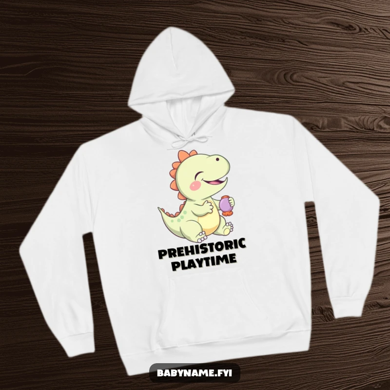 Funny Hoodie featuring a giggling baby dinosaur playing with a rattle, offering warmth and a dose of ancient, playful humor.