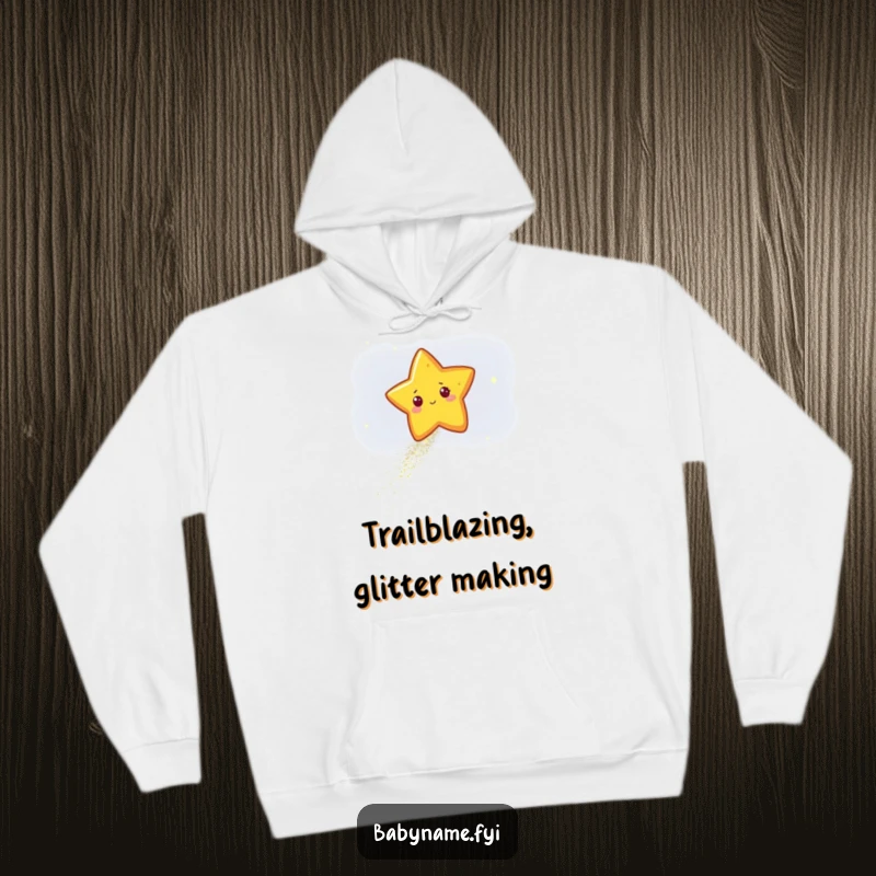 Funny star character leaving a sparkling trail of glitter across a dark sky, featured on a warm and humorous celestial hoodie.