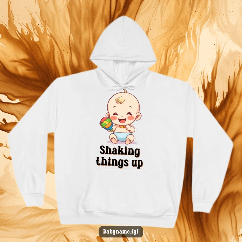 Funny hoodie featuring a happy baby character holding and shaking a colorful rattle. Cozy and cheerful apparel.