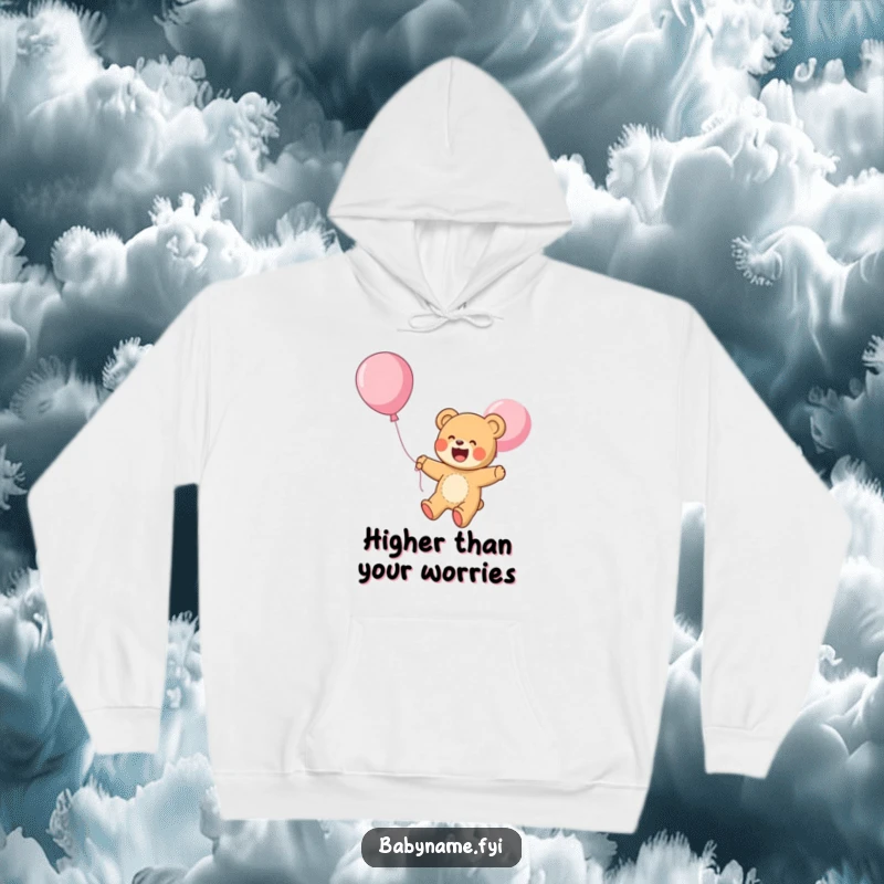 Funny Hoodie: A giggling teddy bear ascends happily on a balloon, bringing cozy whimsical charm and joyful adventure to your day.