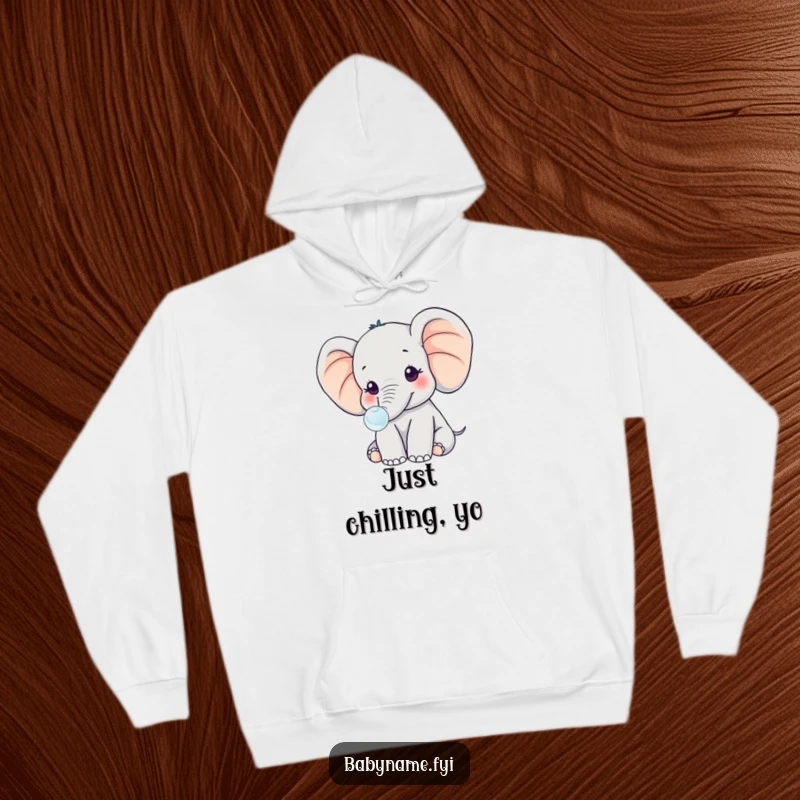 Funny kawaii baby elephant with large ears, focused on blowing a tiny bubble, bringing cozy and humorous vibes to this hoodie.