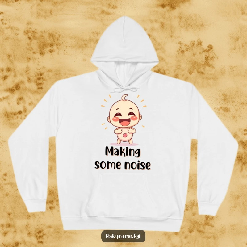 Funny baby rattle character shaking intensely with joy, depicted on a comfortable hoodie. A warm and humorous piece.