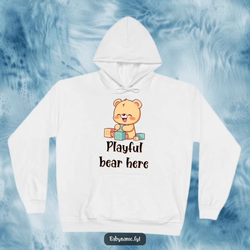 Funny hoodie featuring a tiny baby bear character joyfully giggling while playing with a pile of colorful building blocks, radiating happiness.