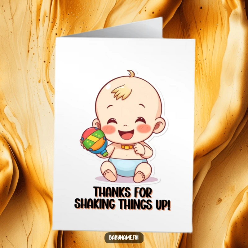Funny free printable thank you card: a smiling baby happily shaking a bright, colorful rattle.