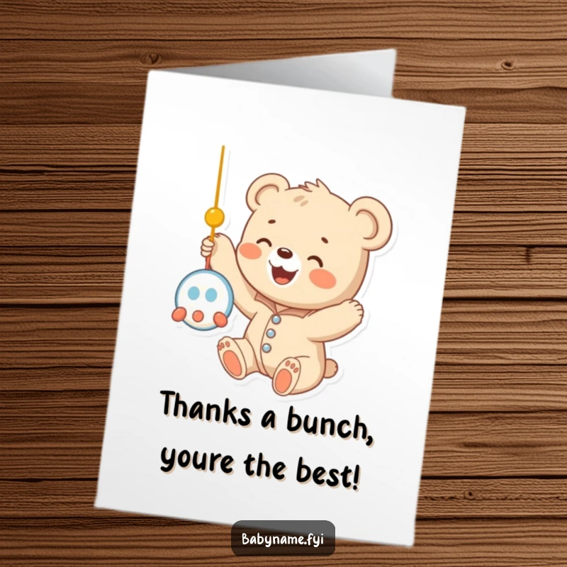 Funny Free Printable Thank You Card: Baby bear cub in a onesie reaching for a mobile, expressing thanks sweetly.