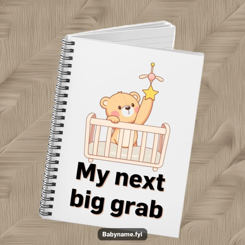 Funny teddy bear reaching for a crib mobile on a notebook cover. A cute and humorous journal for daily notes.