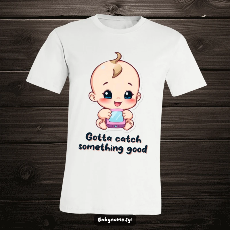Funny reaching baby t-shirt depicting a smiling baby character eagerly extending their arm towards a soft, suspended mobile.