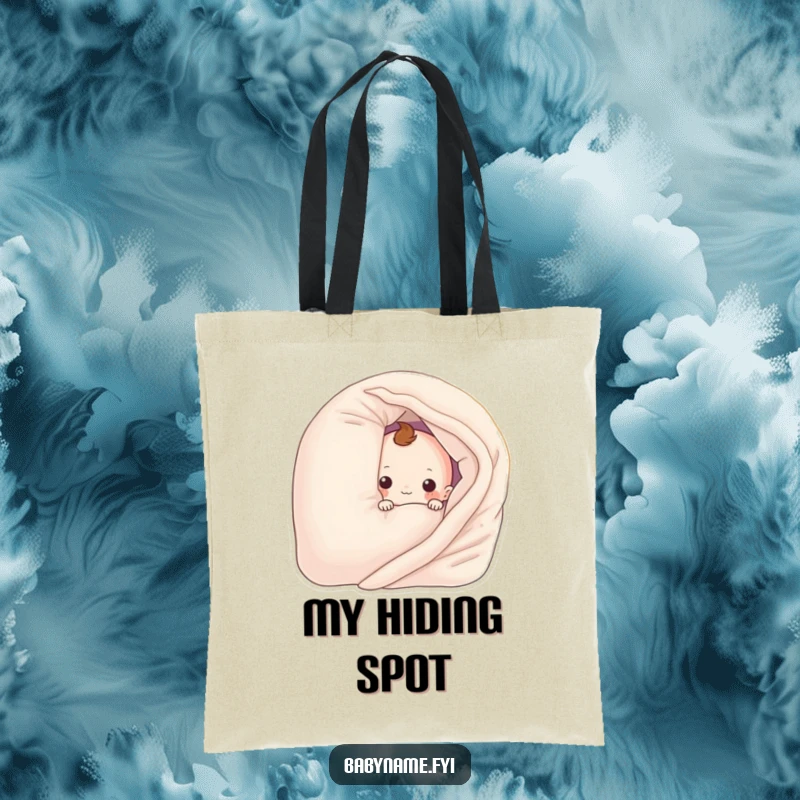 Funny baby blanket character peeking from behind a pillow, depicted on a reusable tote bag. A charming and humorous accessory.