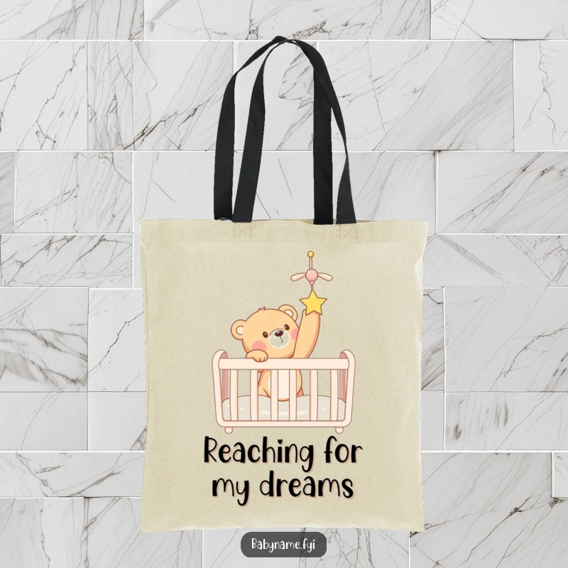 Funny cartoon teddy bear reaching for a crib mobile, depicted on a reusable tote bag. A cute and humorous accessory.